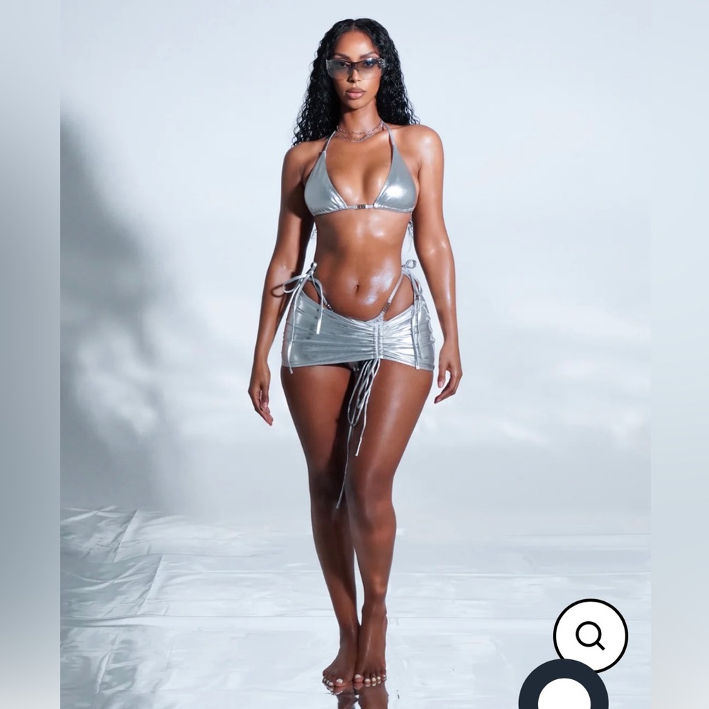 Silver 2 piece bikini with matching skirt. NEW w/ Tags